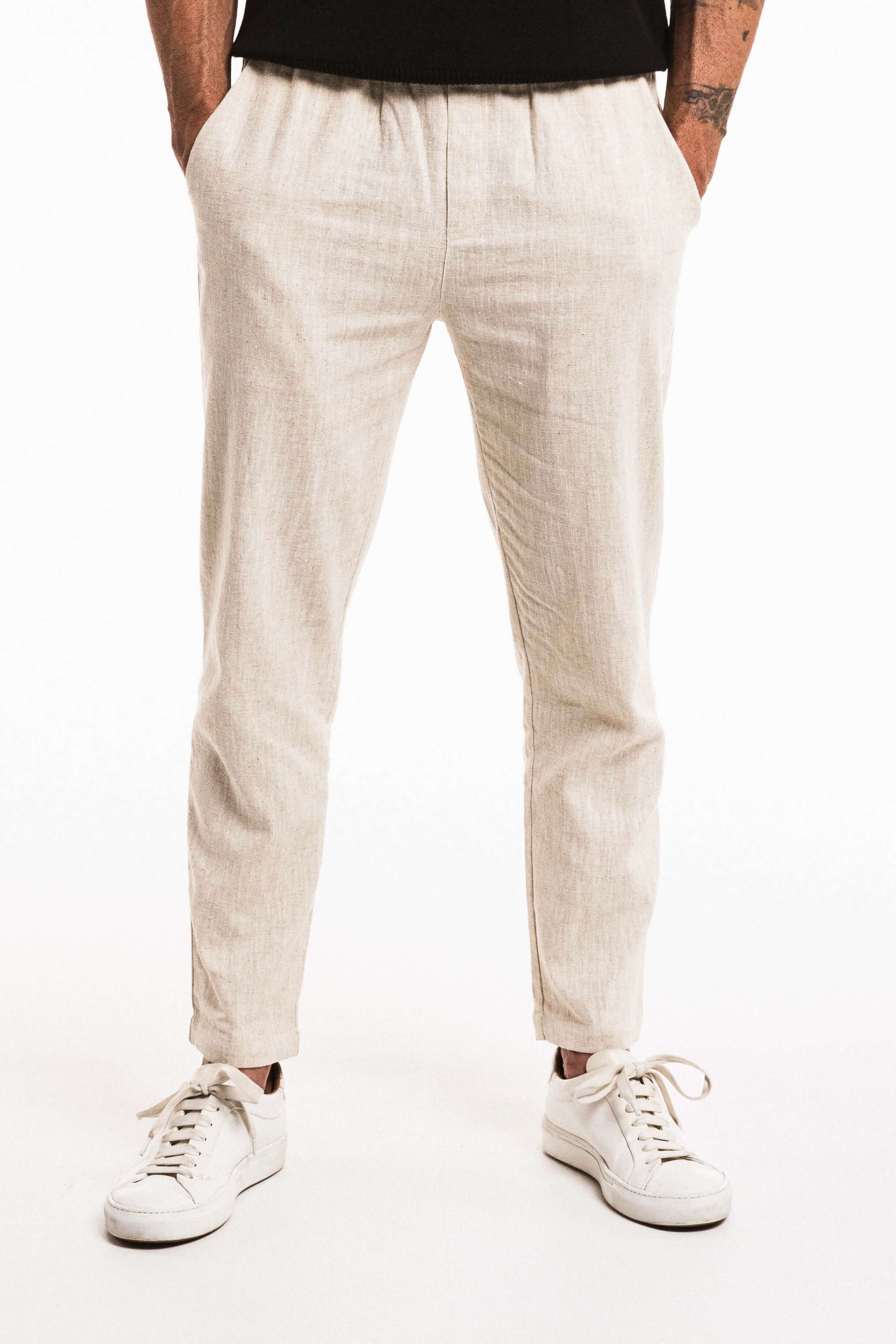 Lounge Linen Pant in Wheat, showcasing a straight-leg design with a thick elastic waistband for all-day comfort.