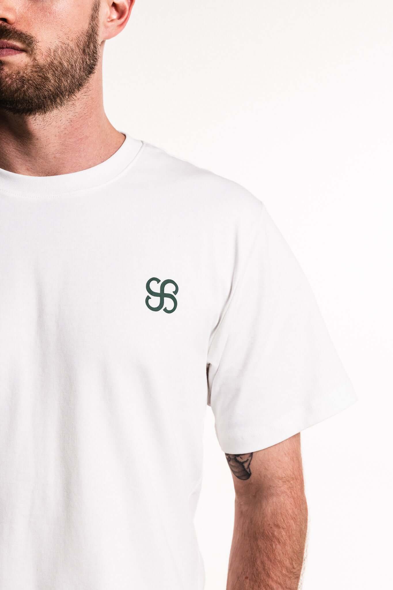 Cotton Typeface T-Shirt featuring a white design with forest green branding on the chest.