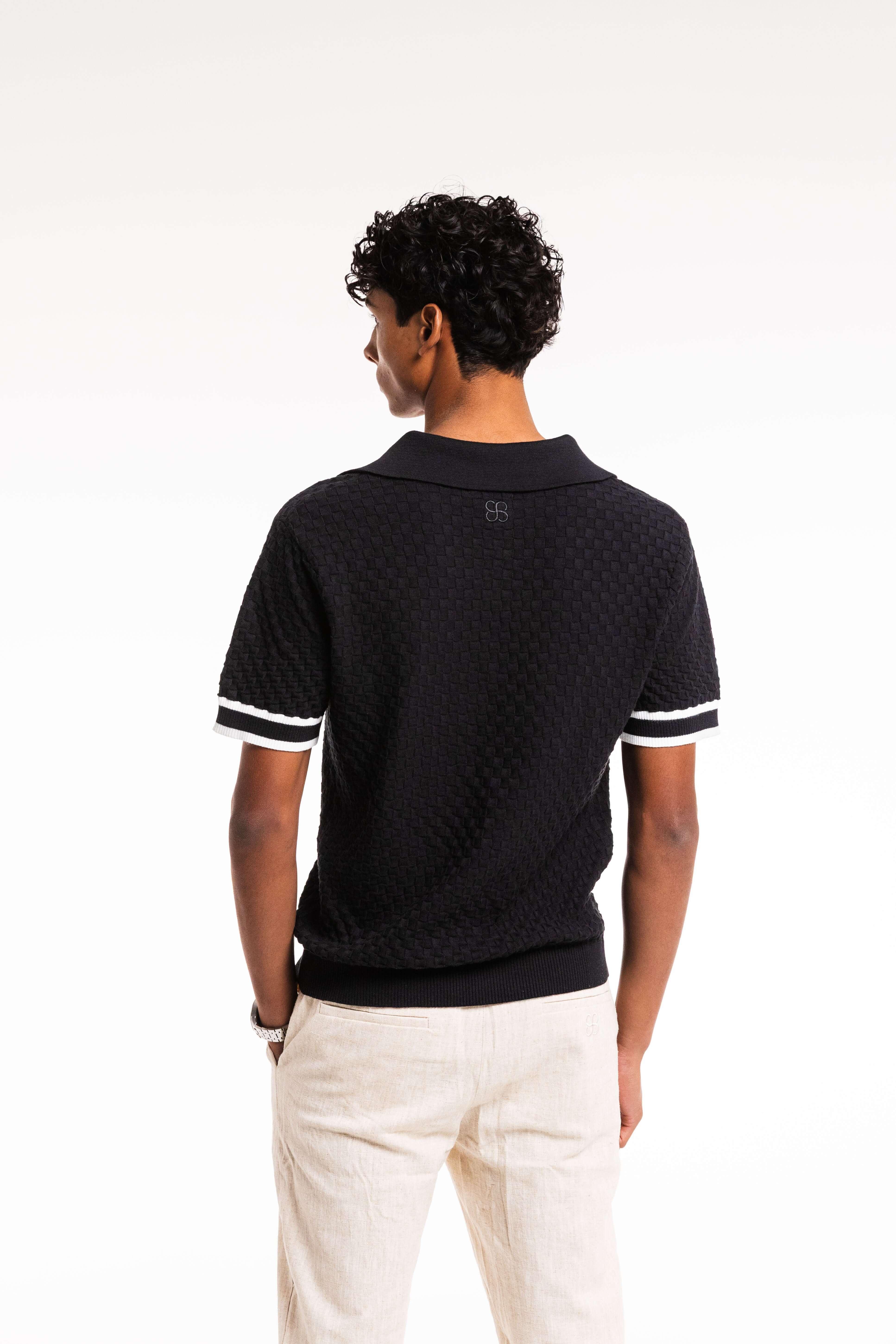 Close up view of Checkered Polo showing fit and ribbed hem