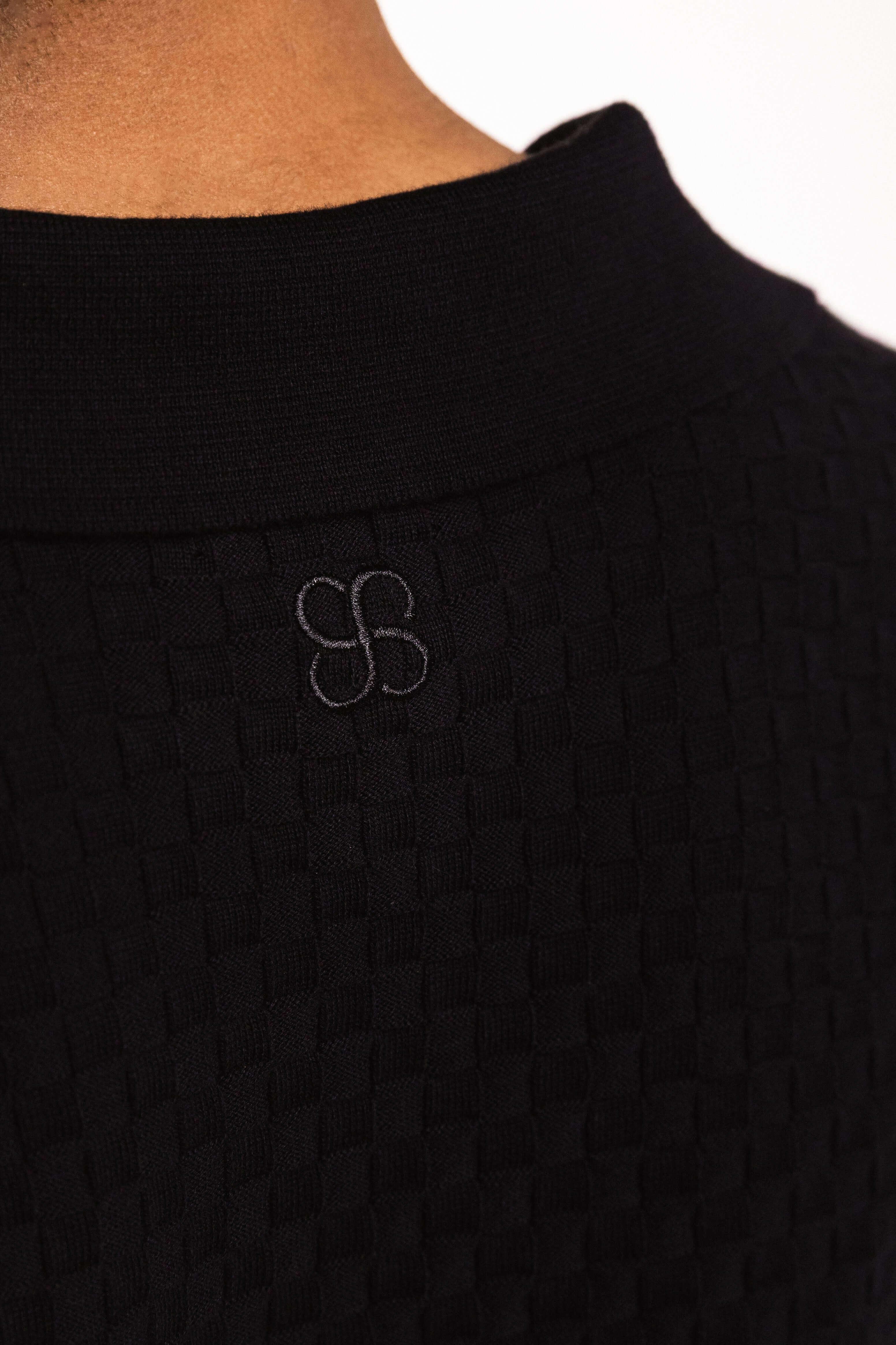 Checkered Cotton Knit Polo detailing showing the tonal pattern and embroidered logo on the collar.