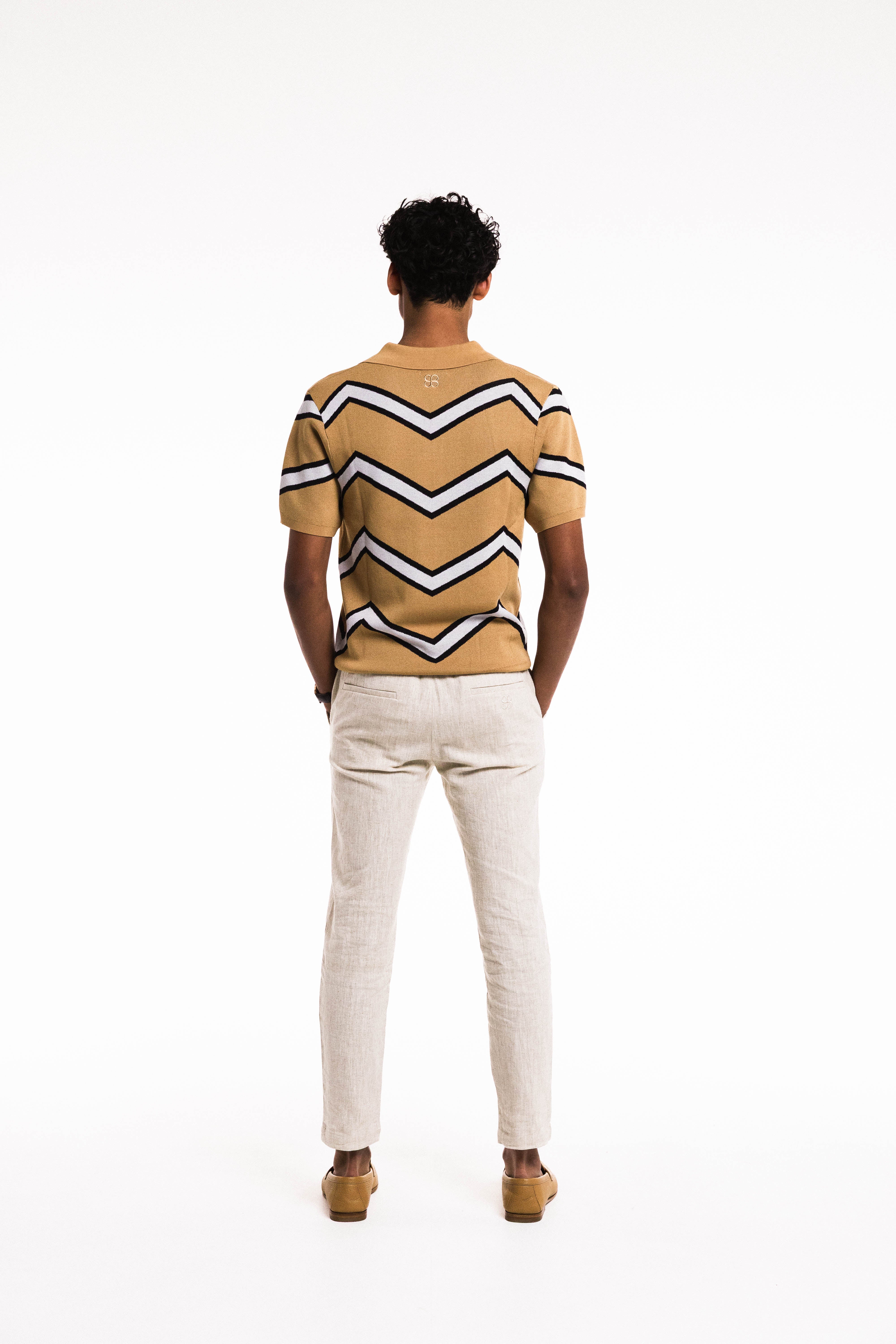 Back view of Chevron Polo in Caramel with ribbed collar and clean hem
