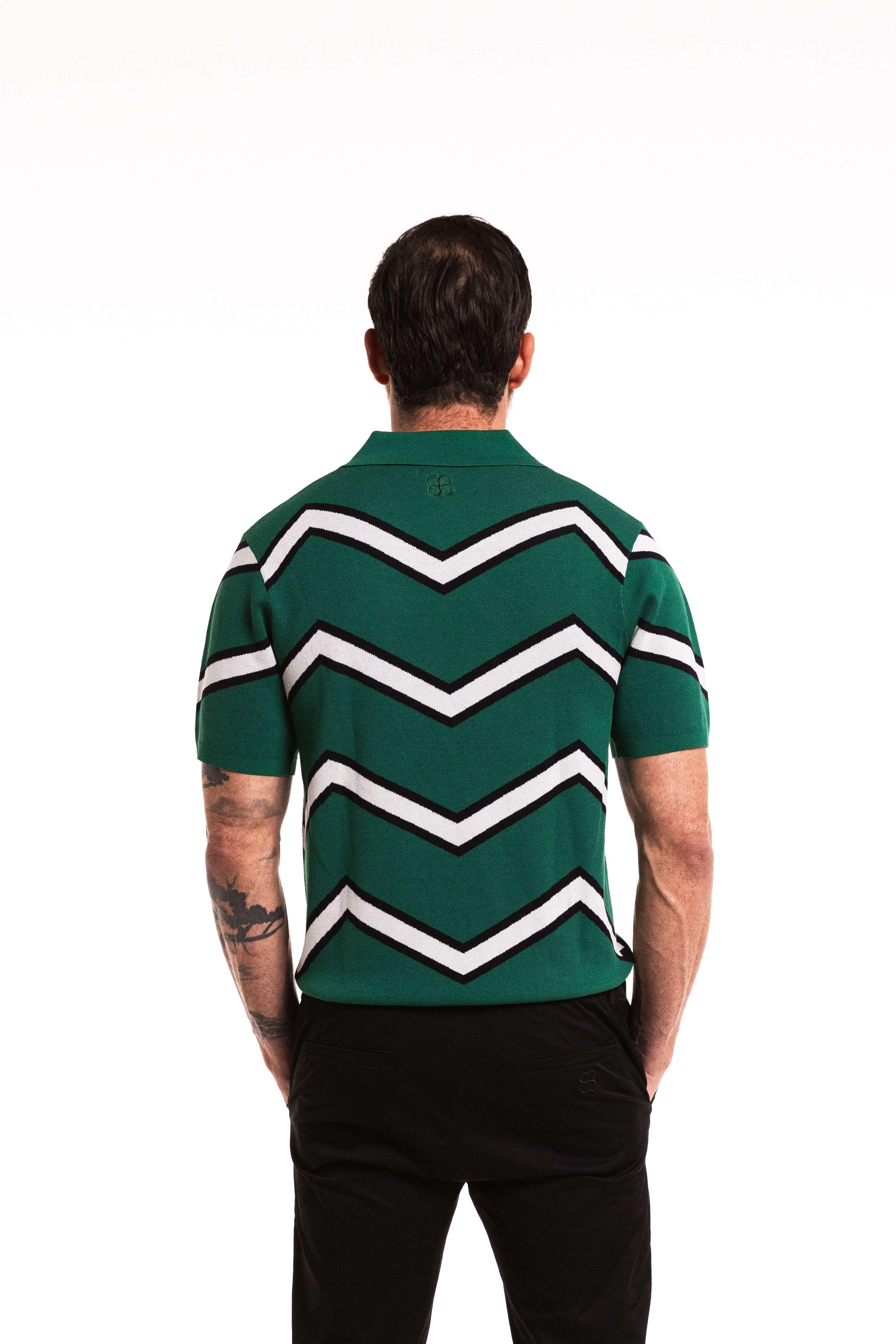 Model wearing Chevron Polo in Forest Green – close up back view standing