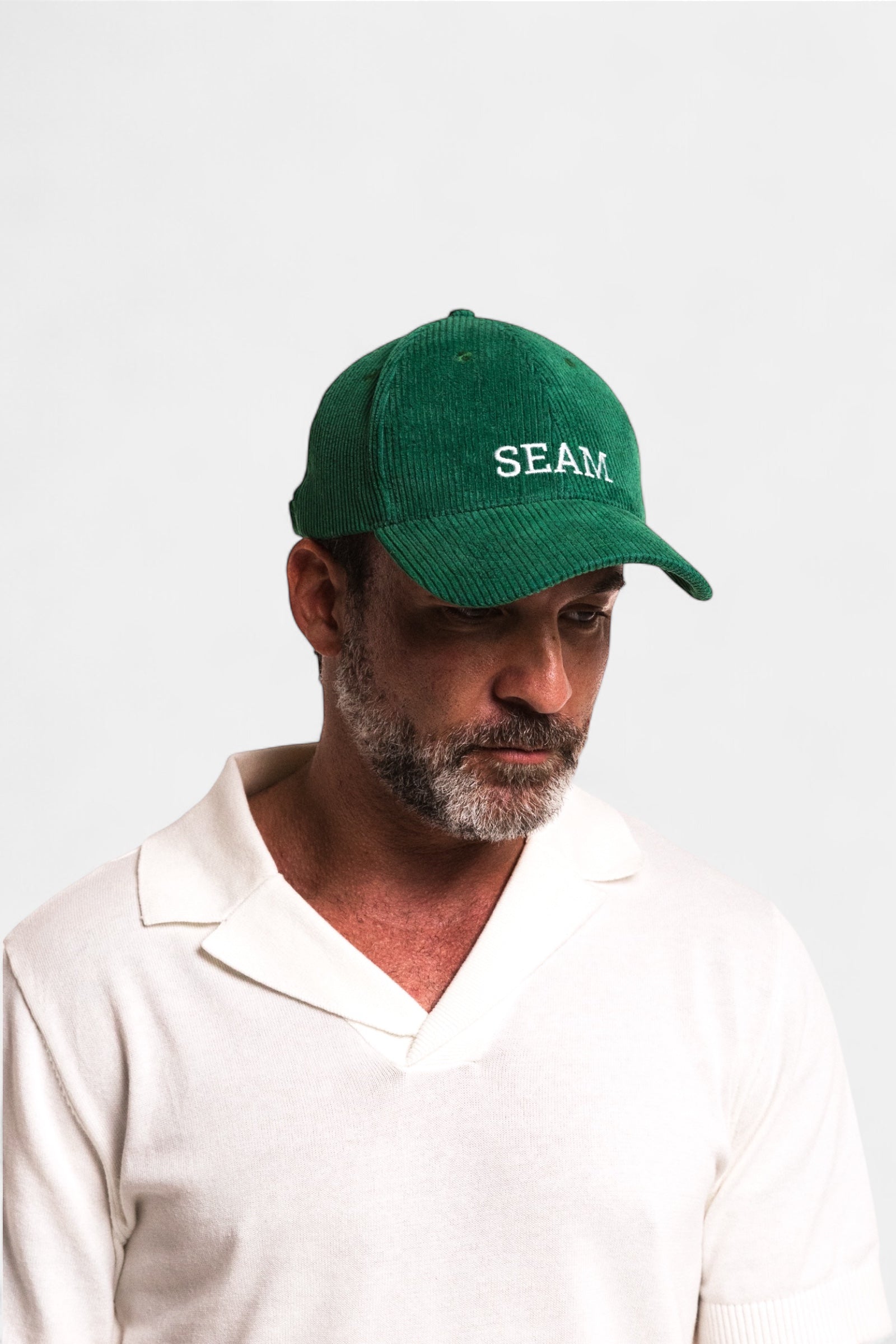 Model wearing Forest Green Corduroy Hat – casual styling