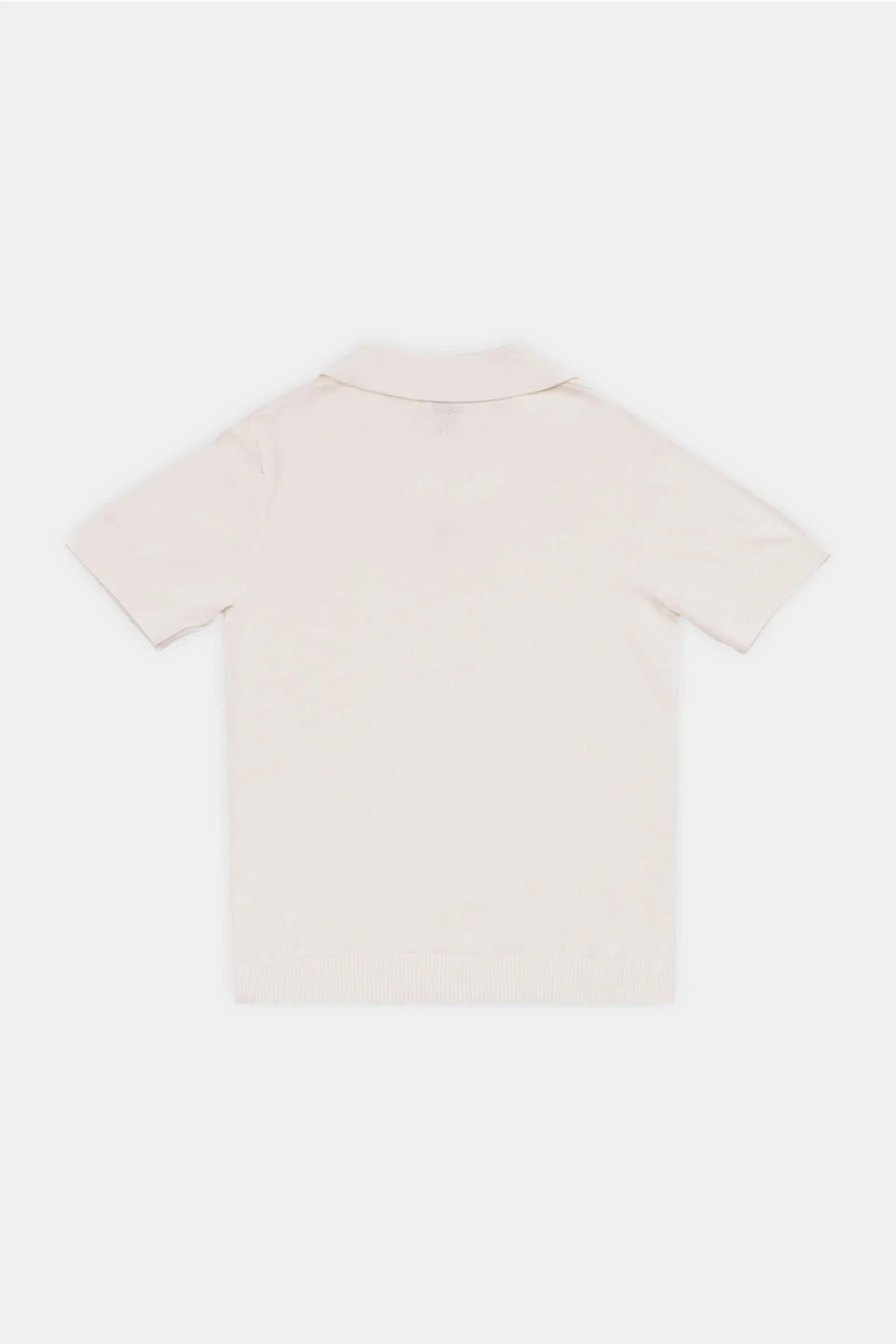 Flat lay of Classic Polo in ivory – back view with structured cut