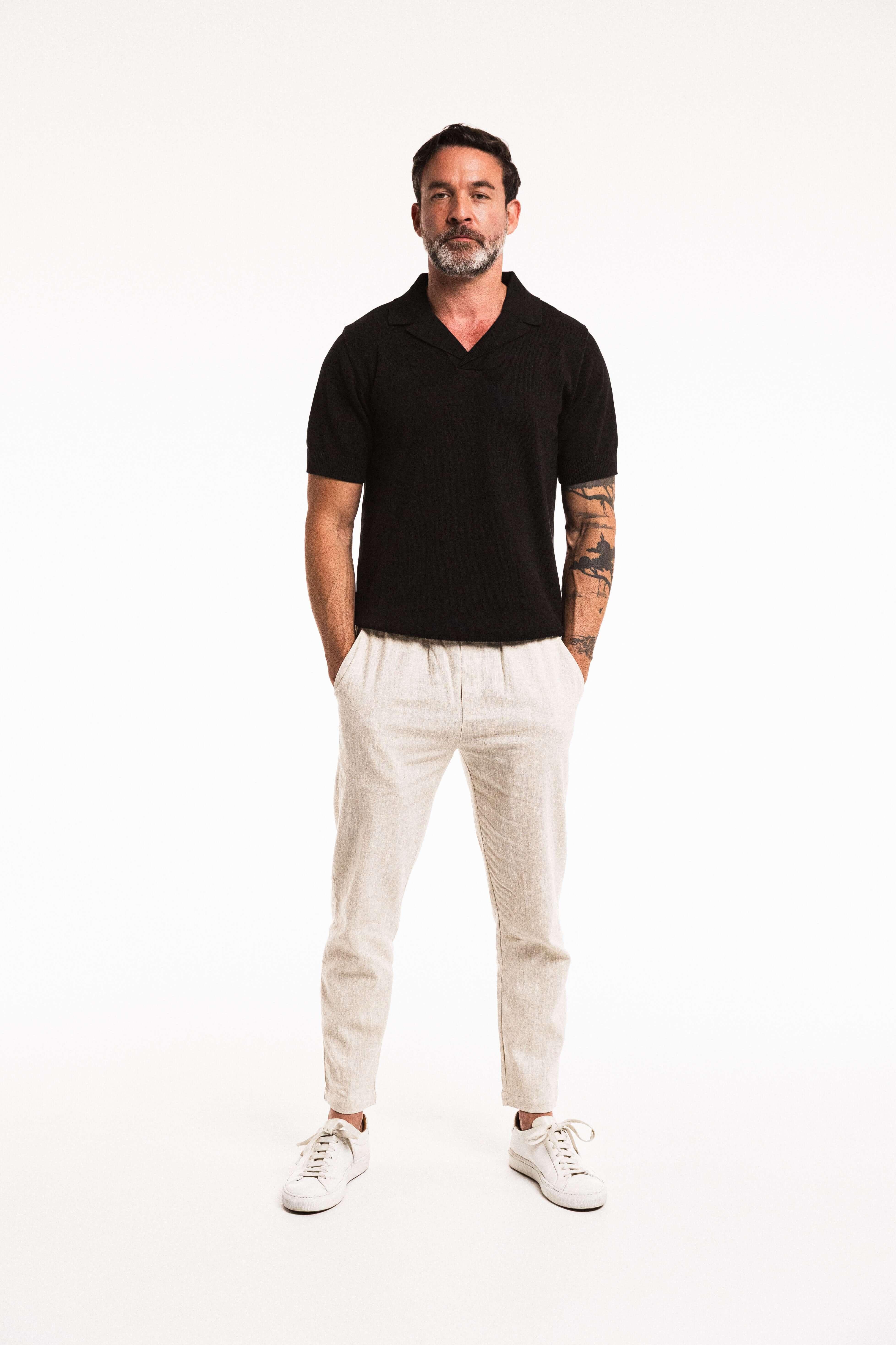 Full front view of model in Classic Polo – Obsidian color styled casually
